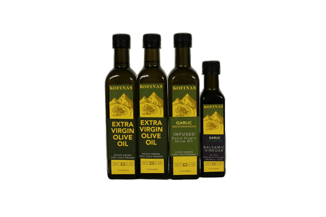 Four Kofinas olive oil bottles grouped together
