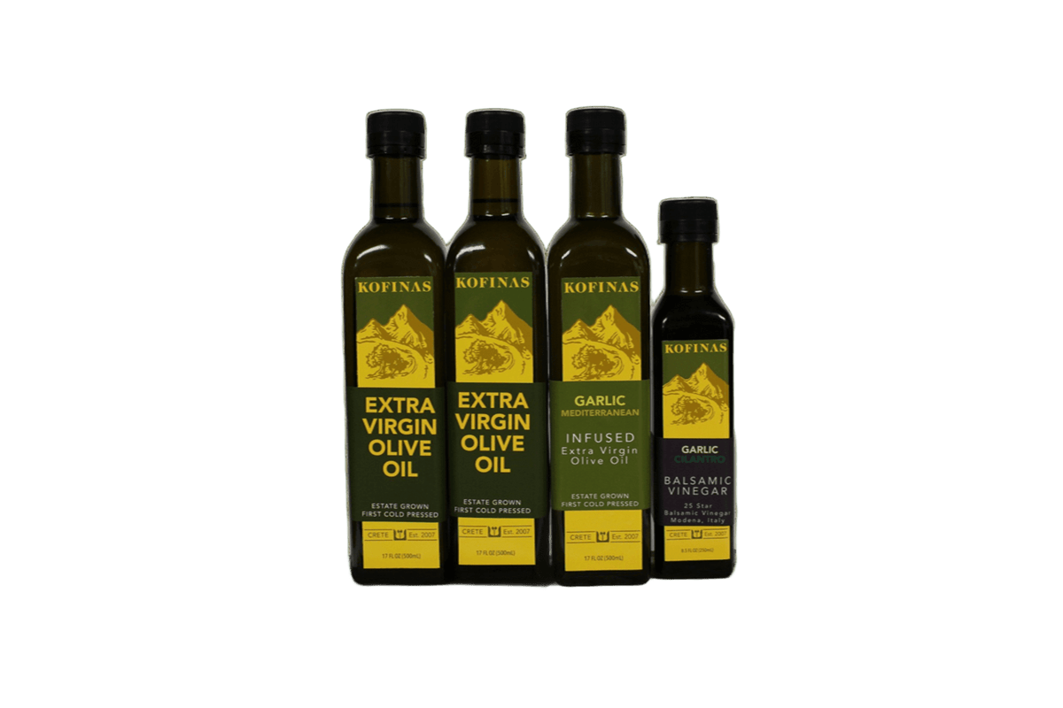 Four Kofinas olive oil bottles grouped together