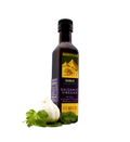 Kofinas Garlic dark balsamic vinegar in a bottle with a garlic bulb and cilantro at the base