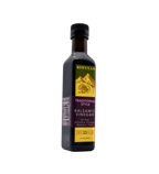 Kofinas Traditional Style aged dark balsamic vinegar in a bottle with a gold and purple label